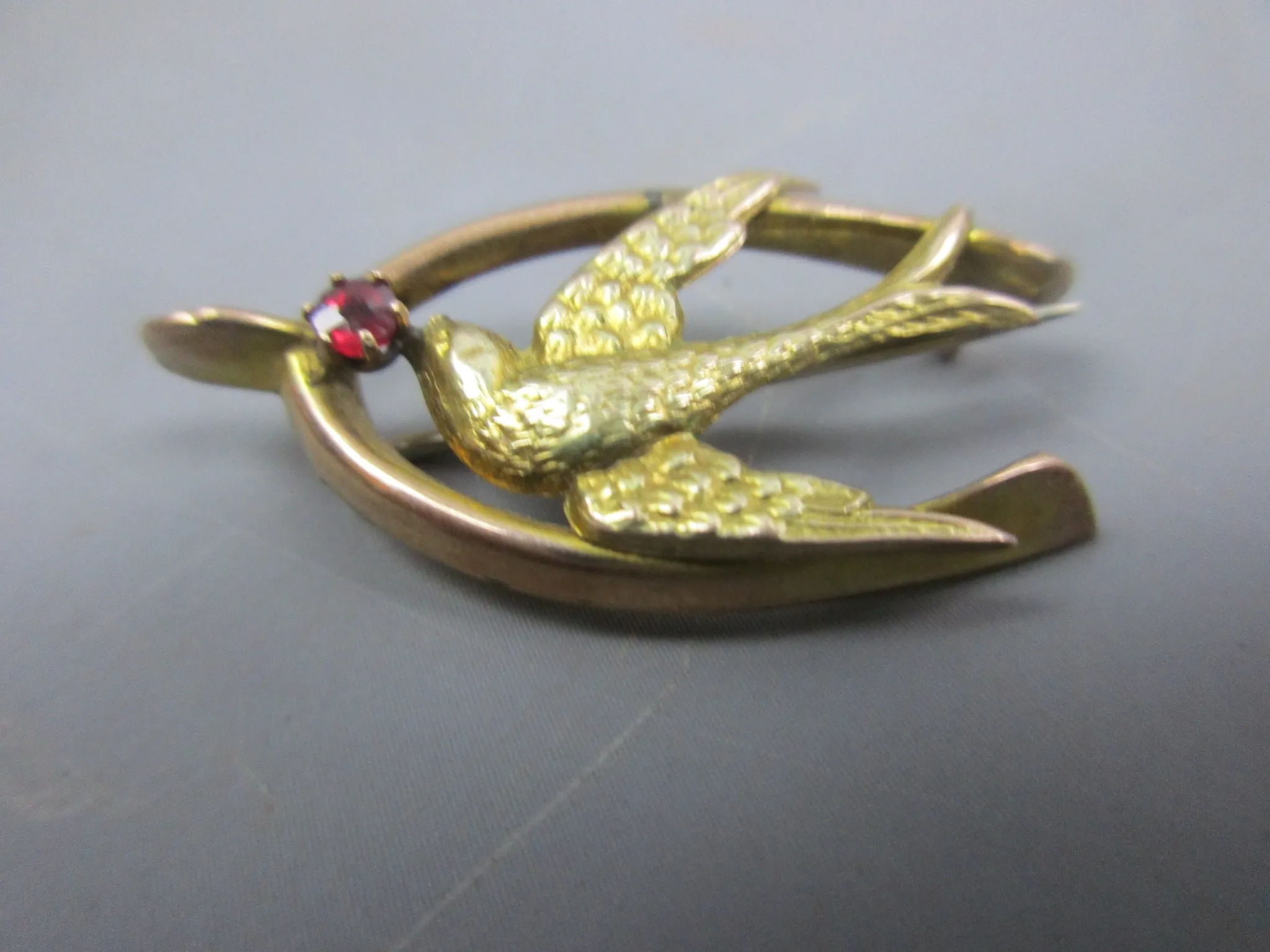 9K Gold And  Garnet Paste Swallow In Lucky Wishbone Sweetheart Brooch Antique Edwardian c1914