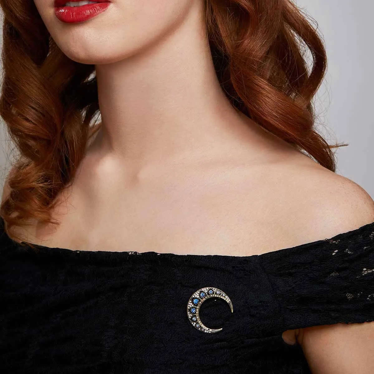 Crescent moon brooch